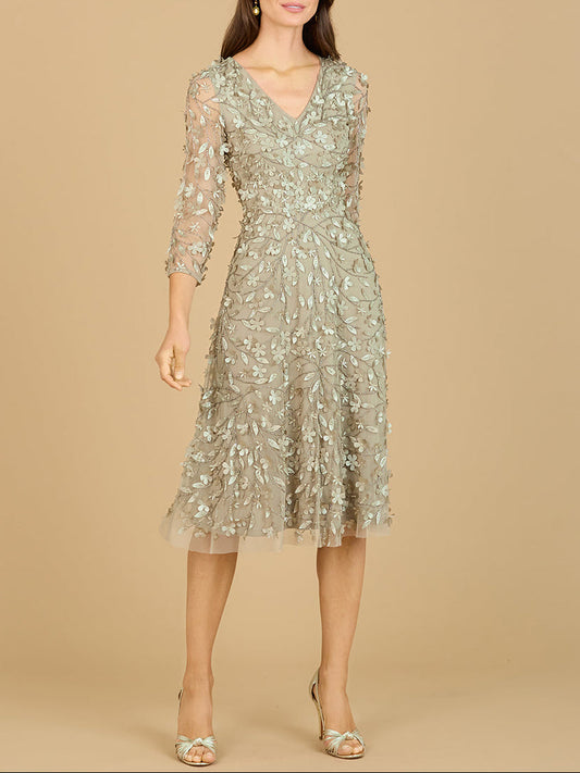 Vestido midi fluido con bordados en 3D y mangas