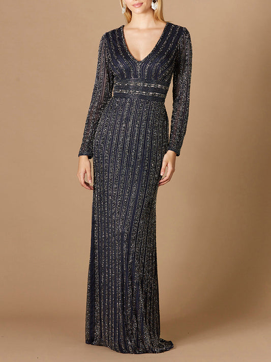 Vestido largo de manga larga con cinturón y pedrería