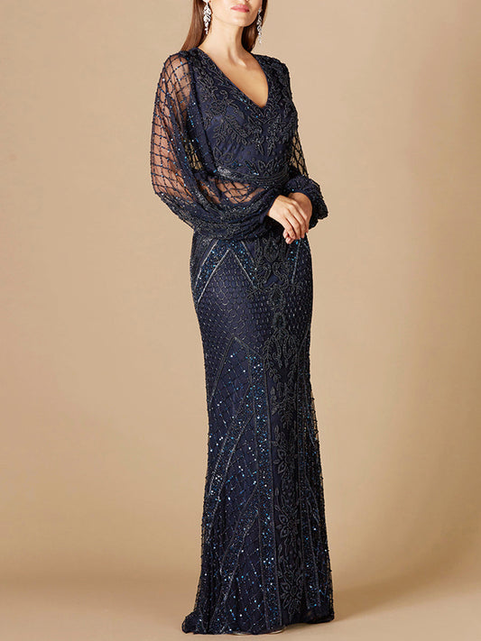 Vestido de mangas largas estilo mariposa con pedrería