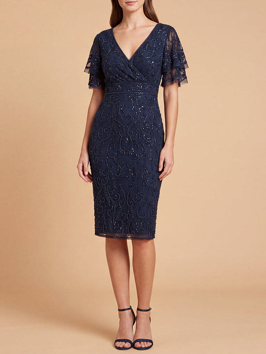 Vestido midi con cuentas y mangas capa