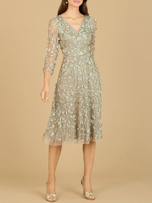 Vestido midi fluido con bordados en 3D y mangas