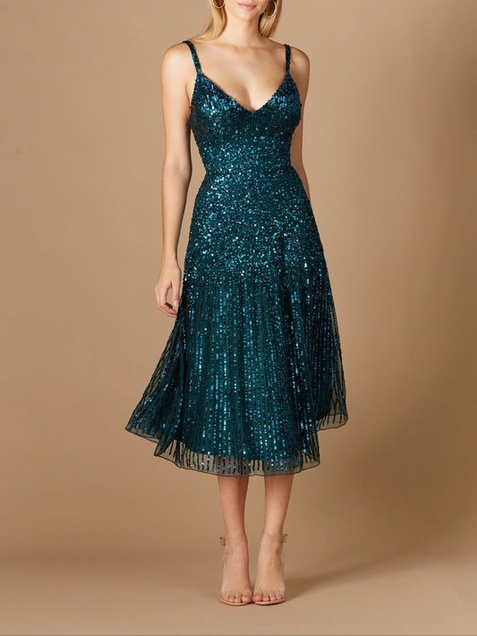 Vestido midi de lentejuelas con caída